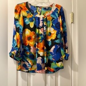 Really pretty multi colored petite small blouse. NY collection.